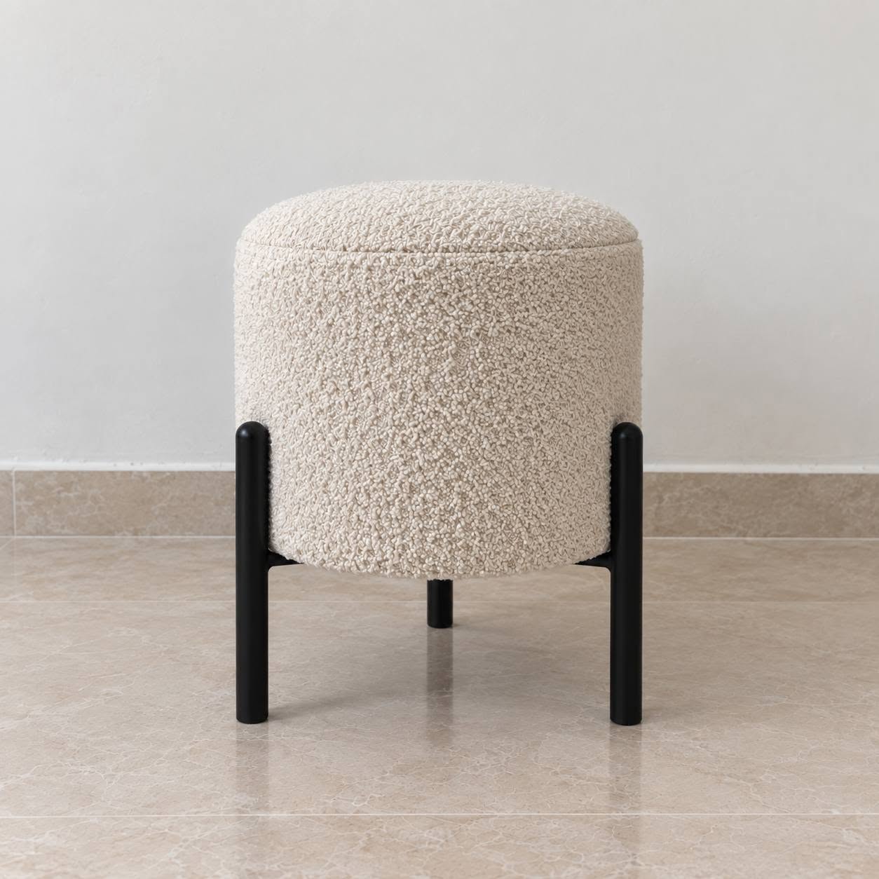 Boucle pouf with metal legs